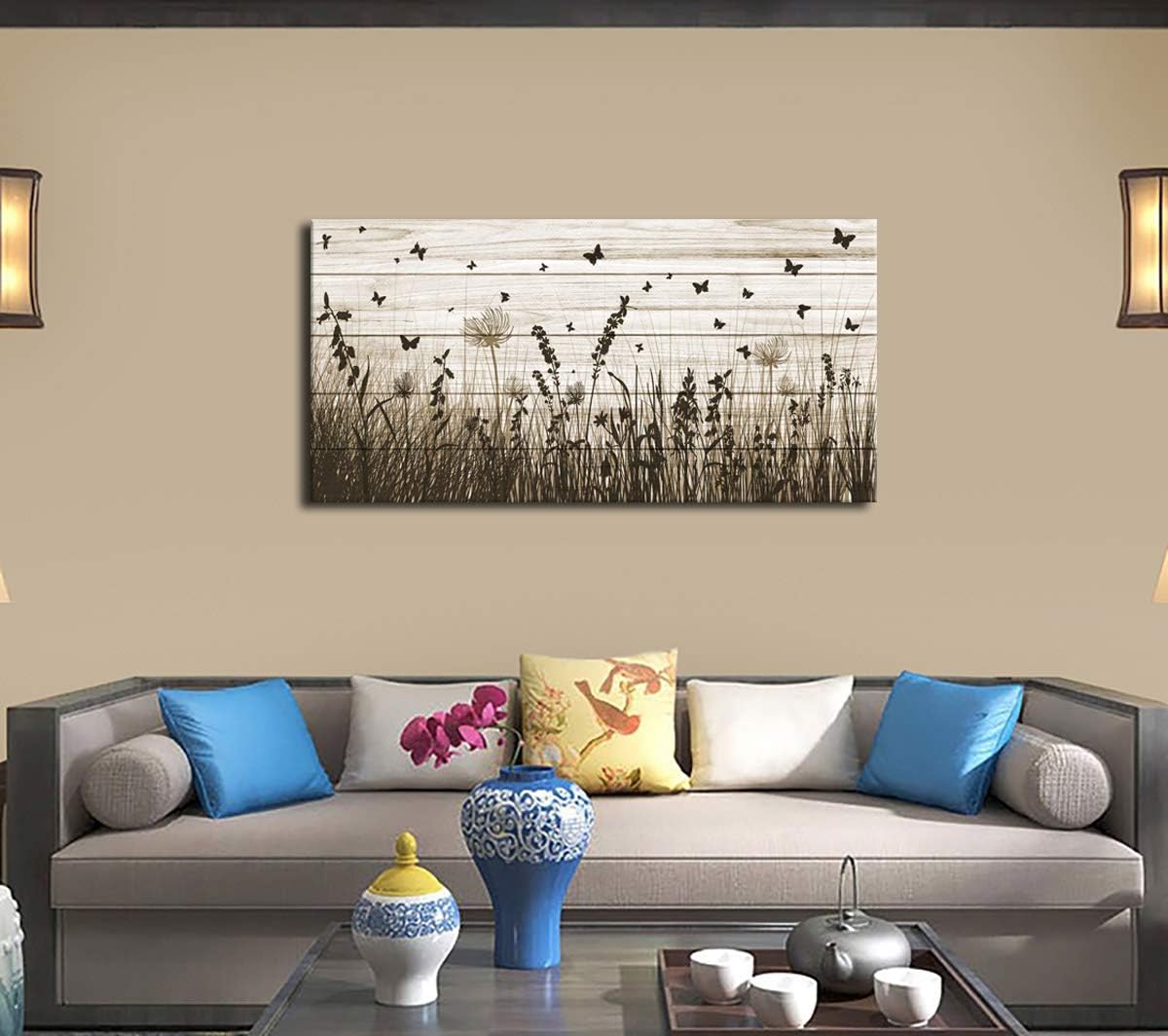 Framed wildflower canvas wall art featuring butterflies and dandelions with warm earth tone palette on wooden frame — view 2