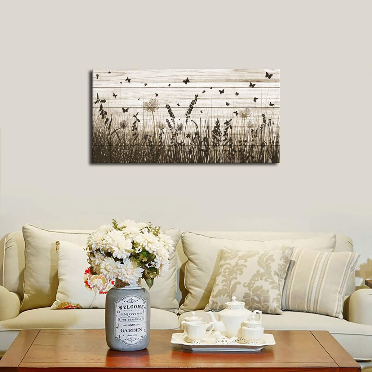 Framed wildflower canvas wall art featuring butterflies and dandelions with warm earth tone palette on wooden frame — view 3