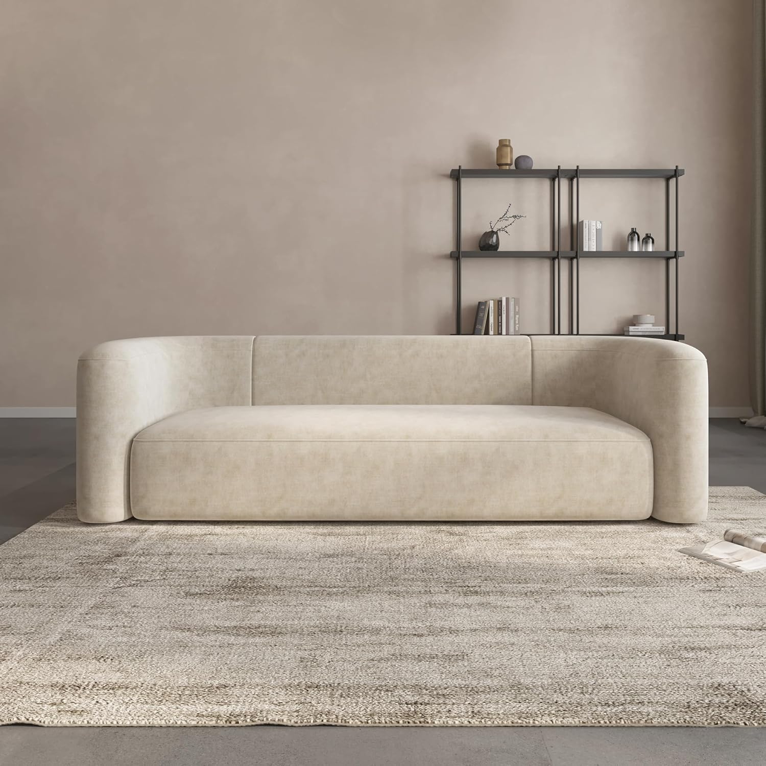 Modern 3-seater velvet sofa with curved back in neutral tone, wood frame detail — view 1