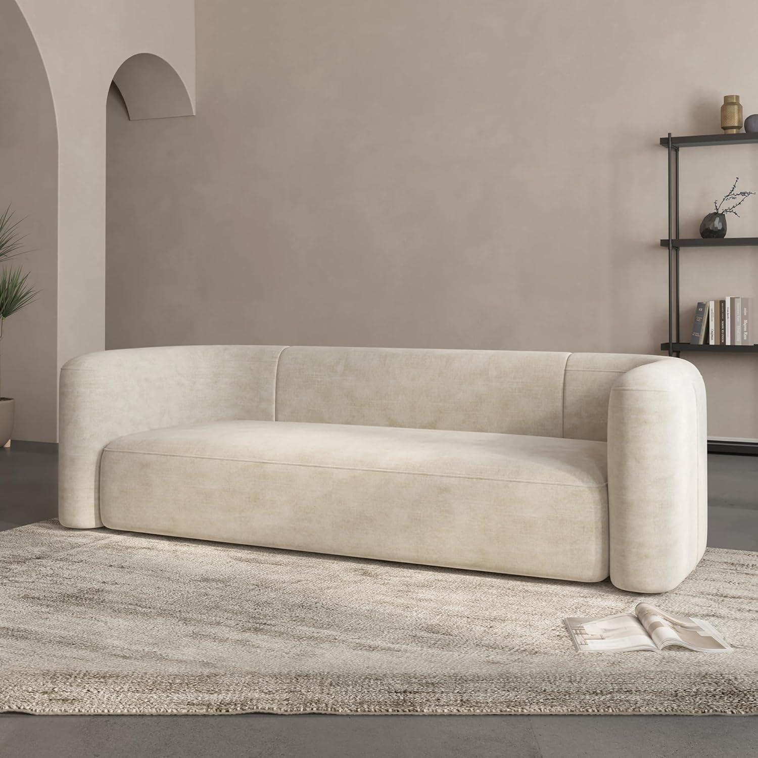 Modern 3-seater velvet sofa with curved back in neutral tone, wood frame detail — view 5
