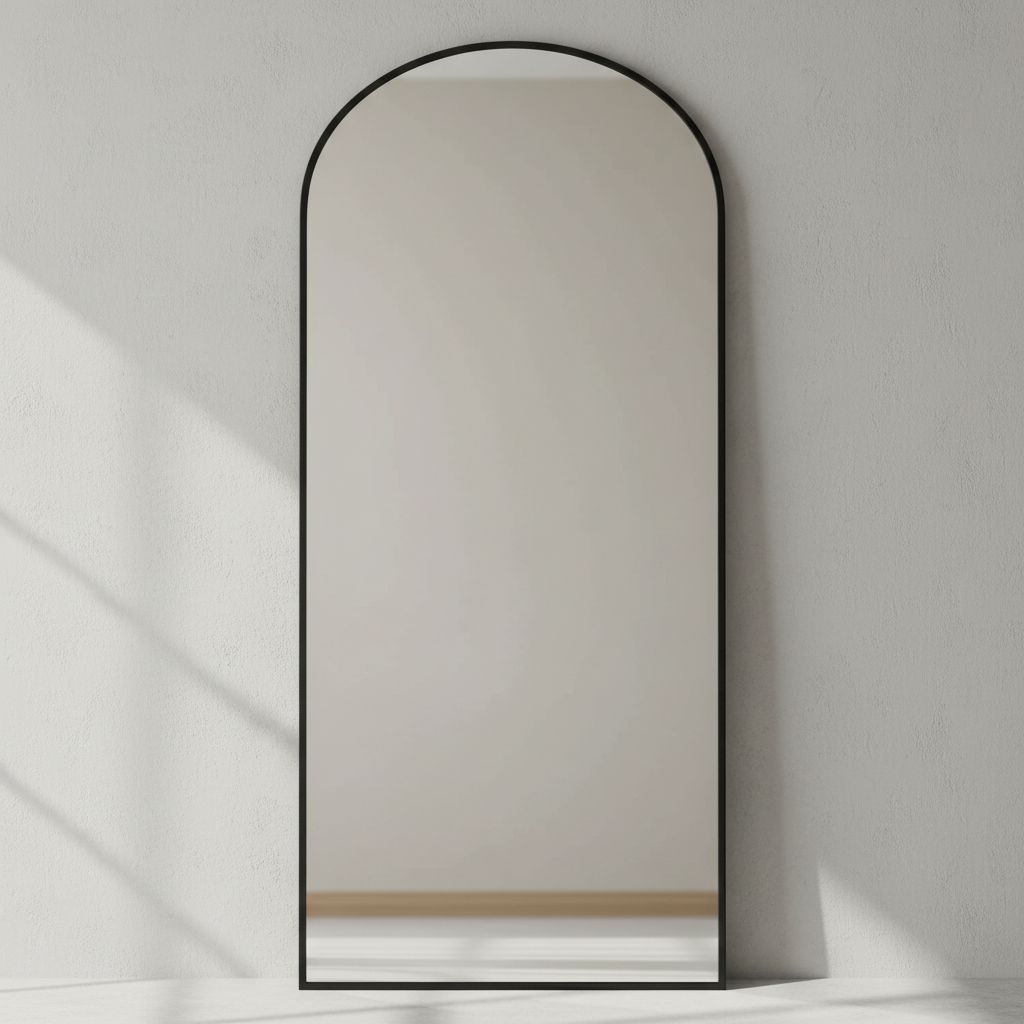 Tall arched floor mirror with black aluminum frame and nano glass panel, modern minimalist design for bedroom — hero view 1