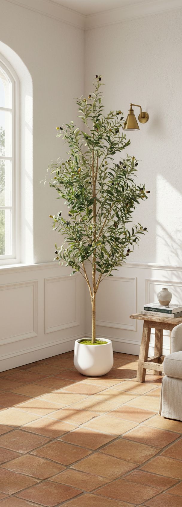 6-foot tall faux olive tree with realistic green polyethylene foliage, natural wood trunk, and white ceramic pot — view 5b