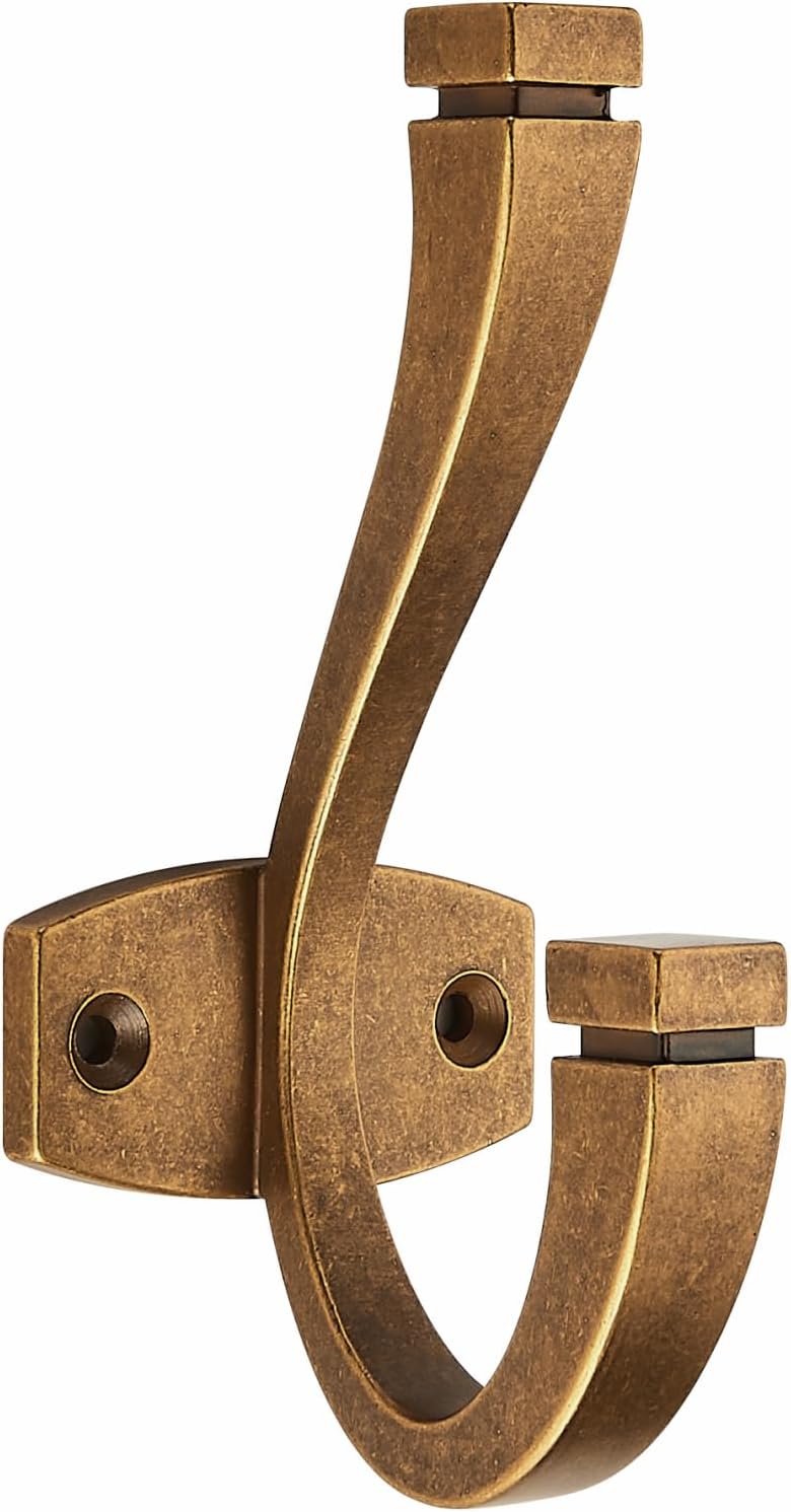 Matte black metal double wall hook with minimalist design, shown mounted on white wall — view 4