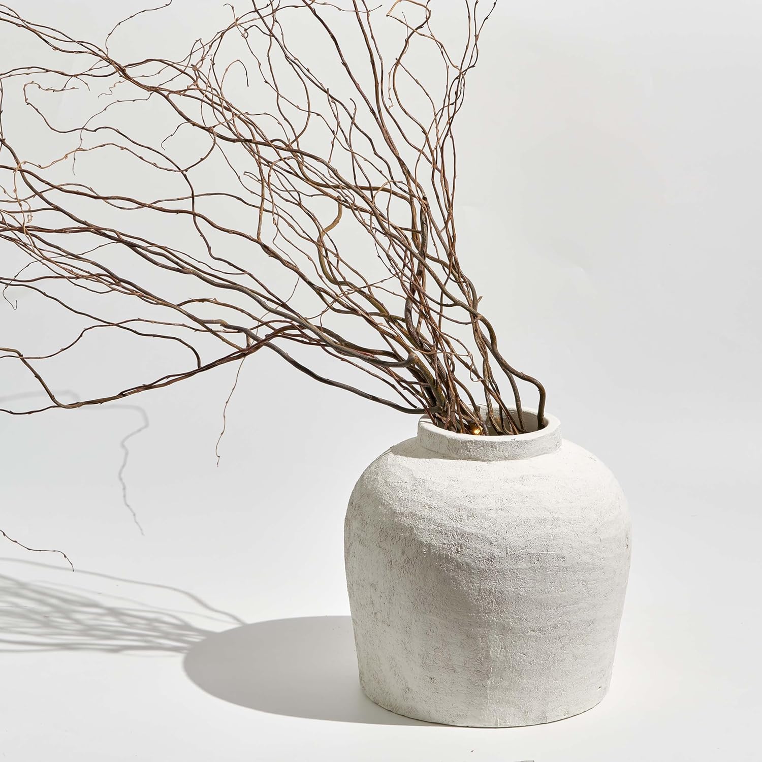 11-inch white ceramic vase with distressed farmhouse finish, shown in {color} against {background} — view 2