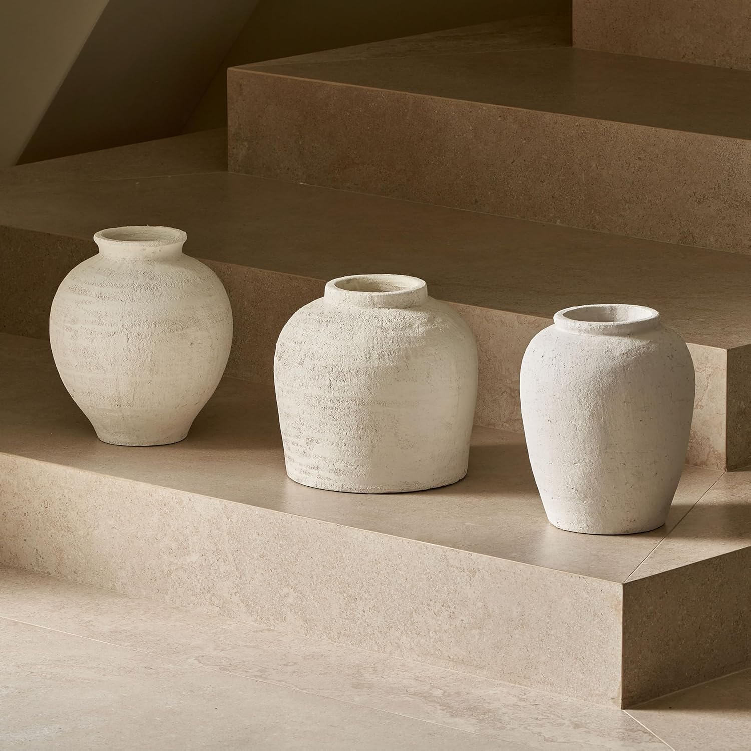 11-inch white ceramic vase with distressed farmhouse finish, shown in {color} against {background} — view 3