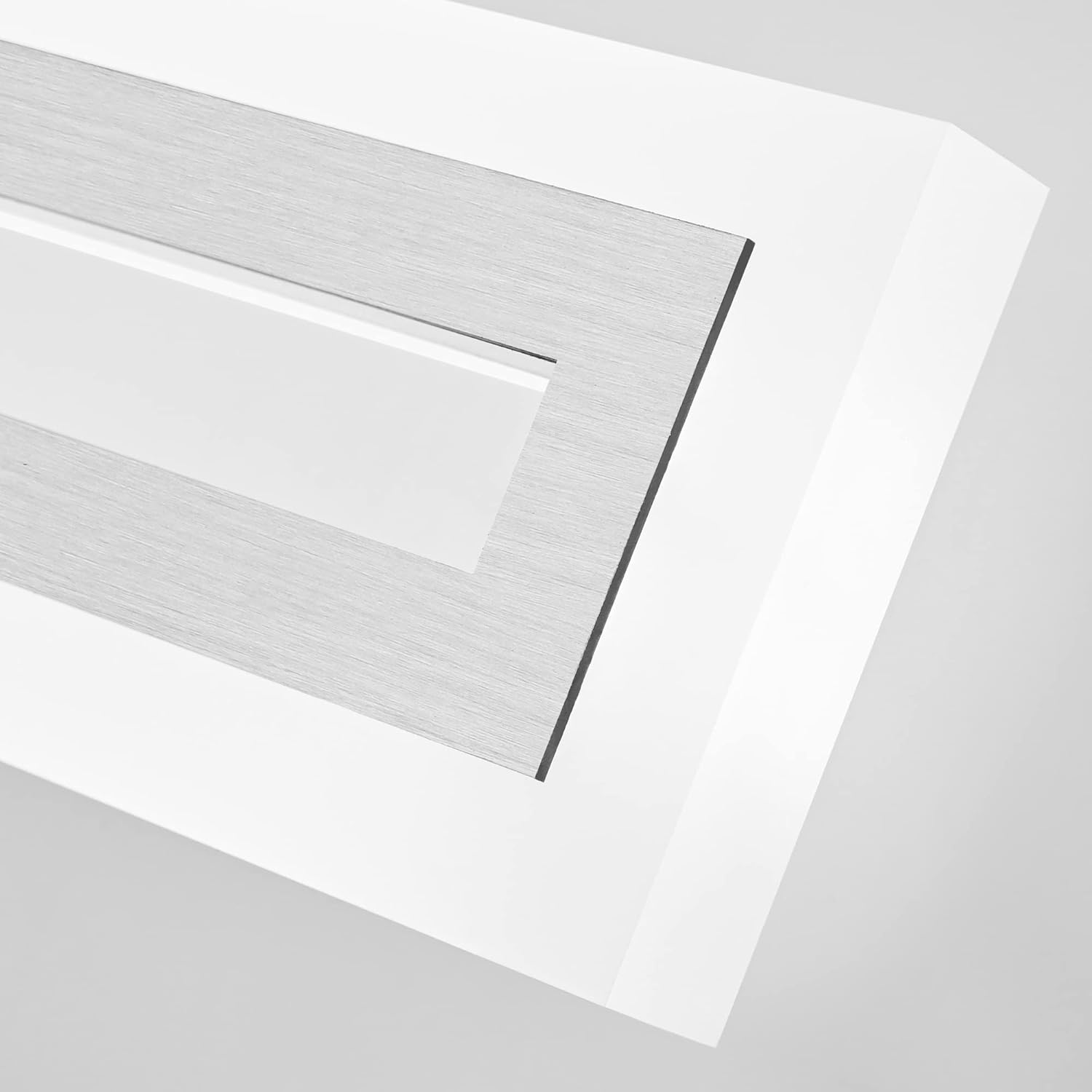 Brushed nickel LED vanity light fixture mounted above bathroom mirror, modern minimalist design with cool-tone lighting — view 2
