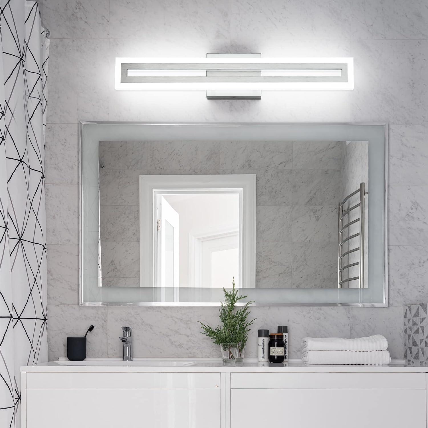 Brushed nickel LED vanity light fixture mounted above bathroom mirror, modern minimalist design with cool-tone lighting — view 2