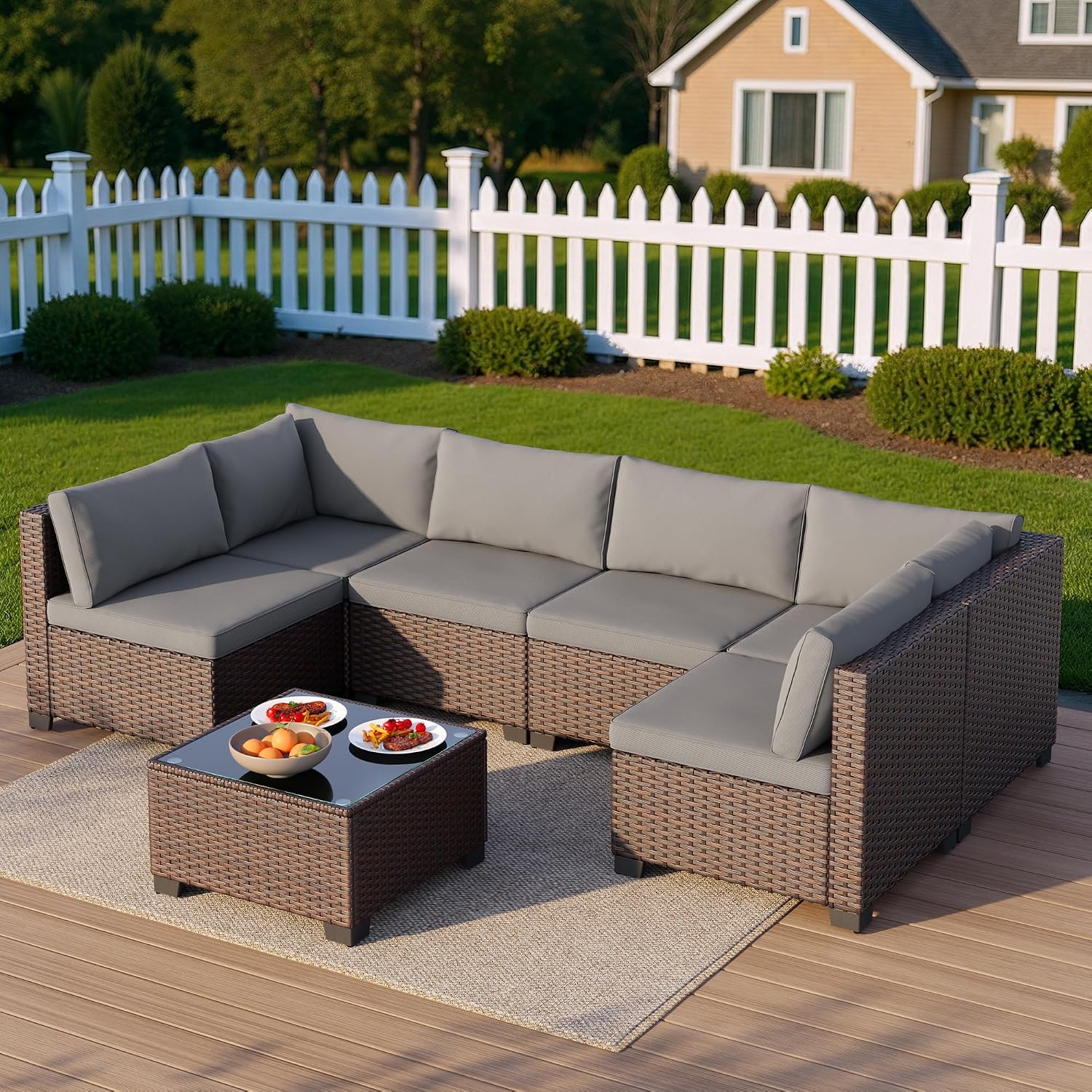 Grey PE rattan wicker sectional sofa set with cushions and glass-top coffee table — detail