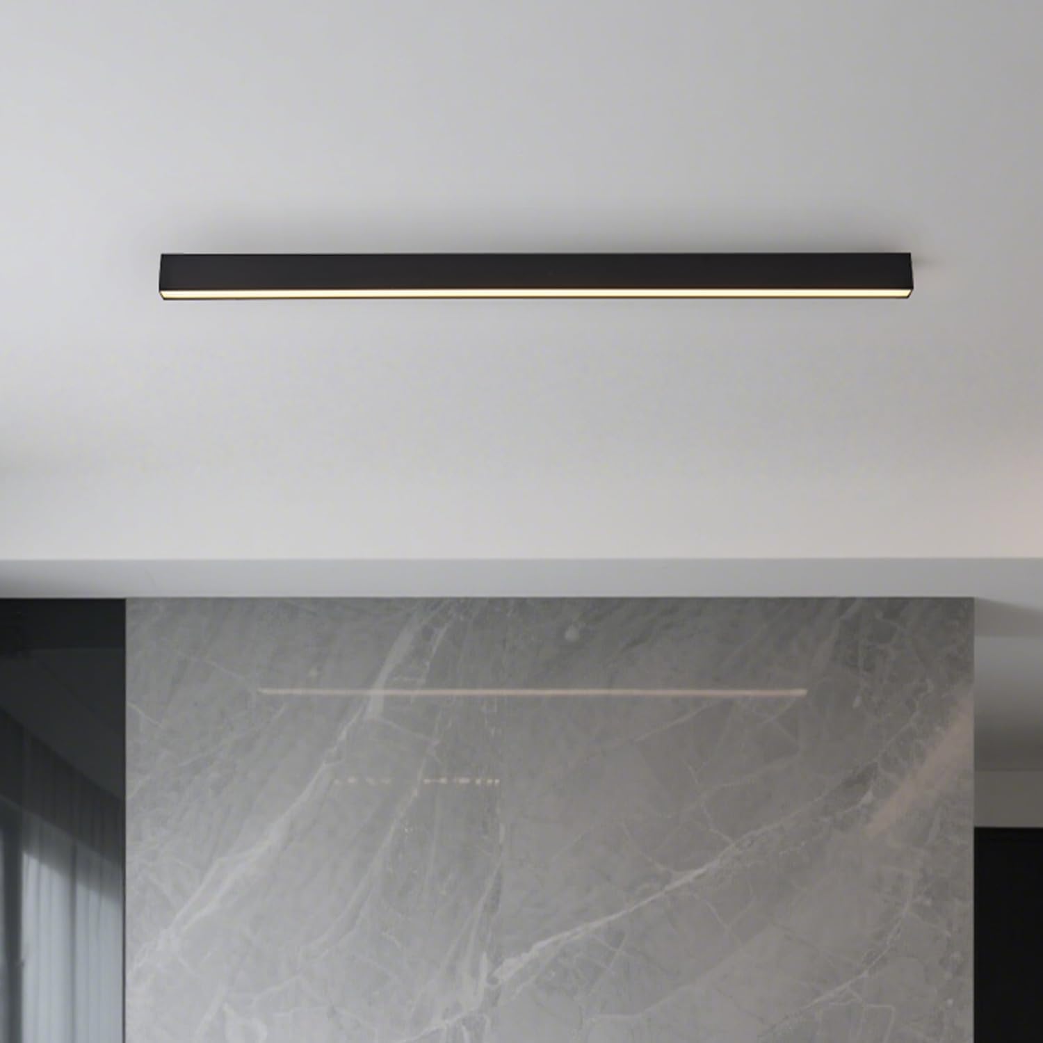 Black metal linear LED ceiling light with remote control, modern minimalist design for living room installation — front