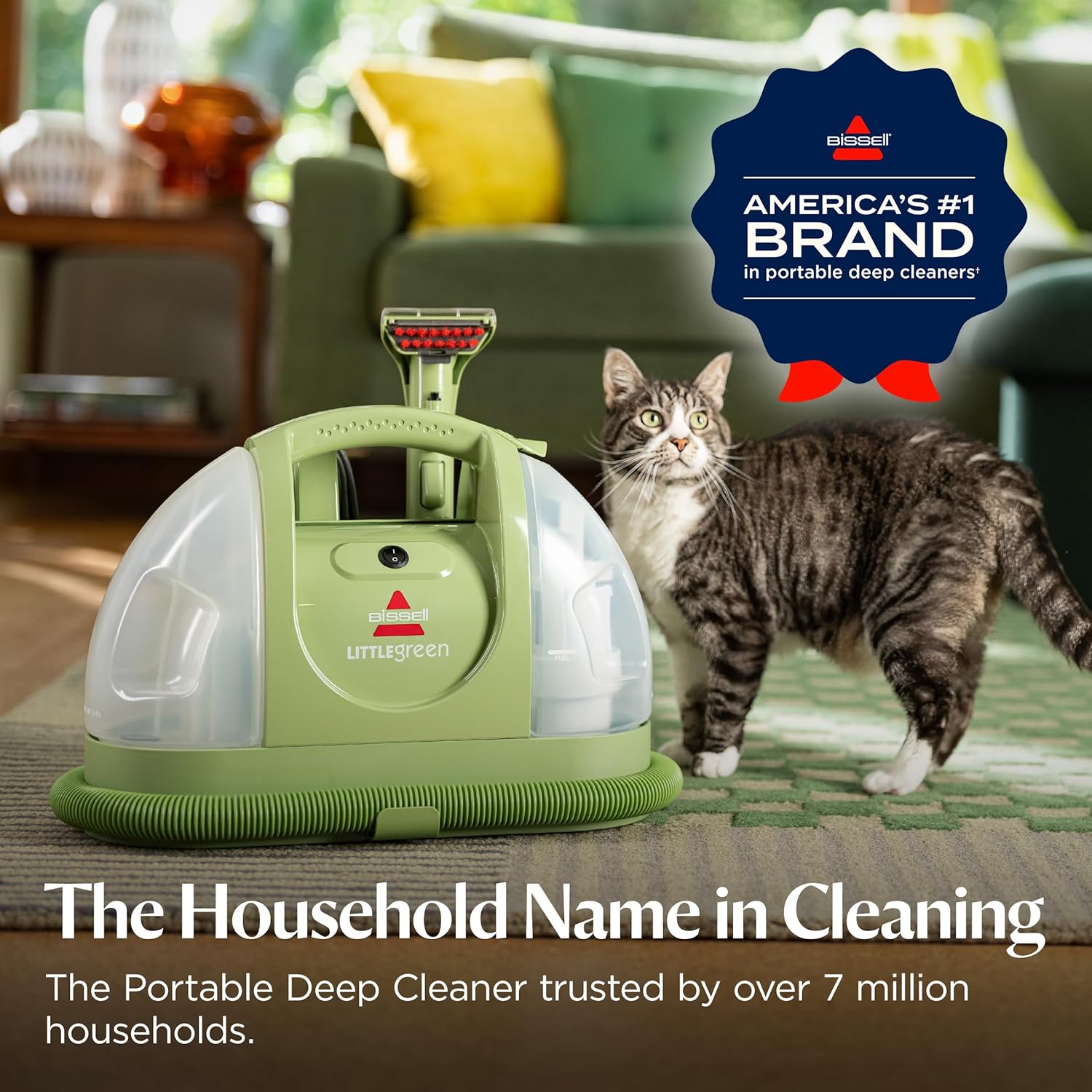Black portable carpet cleaning machine with plastic housing and metal components, shown from front angle on light background — view 2