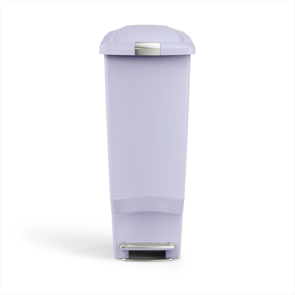 Minimalist black plastic step trash can with secure slide lock mechanism, front view — view 4