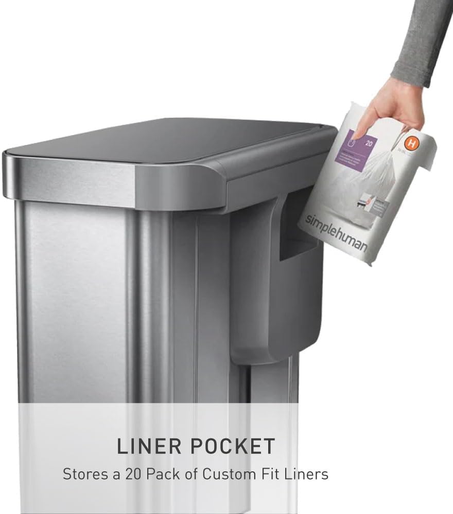 Rectangular brushed stainless steel step trash can with grey plastic lid and pedal mechanism, shown in modern kitchen setting — view 4