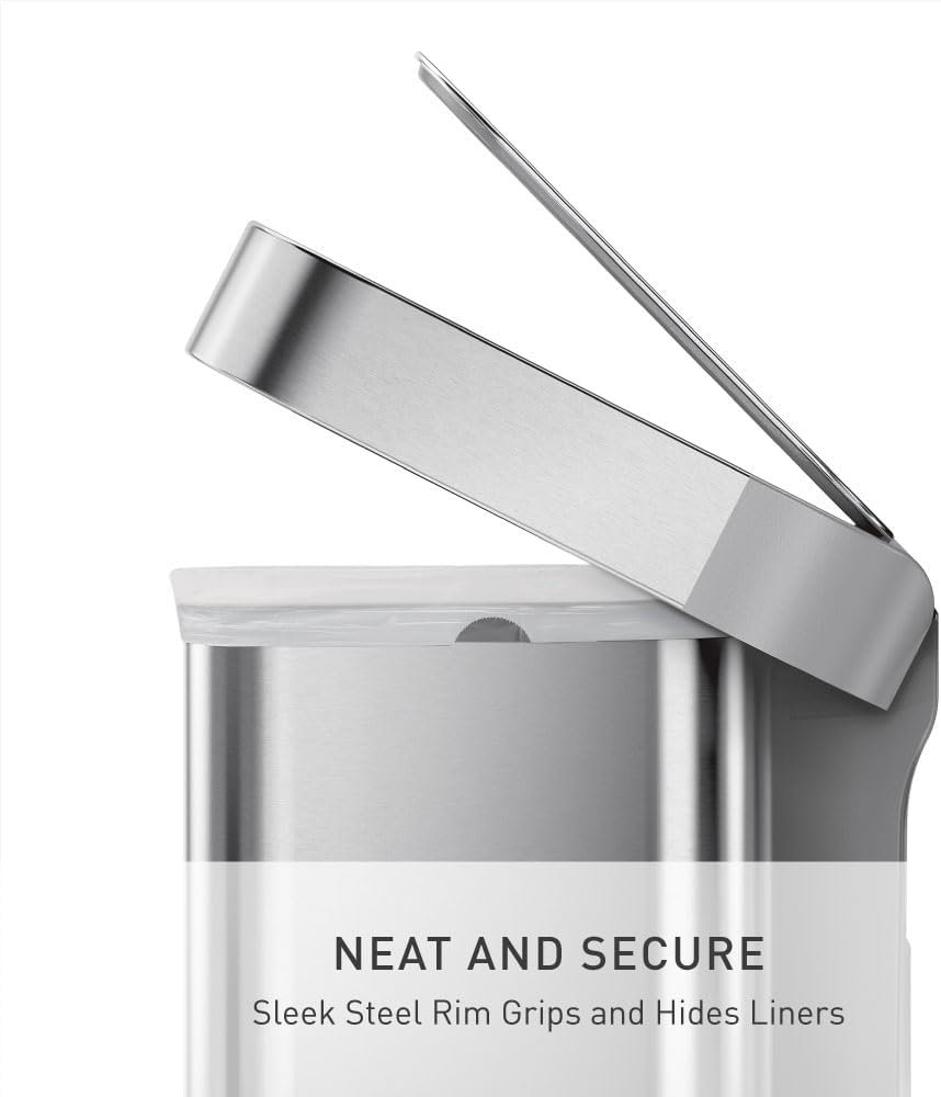 Rectangular brushed stainless steel step trash can with grey plastic lid and pedal mechanism, shown in modern kitchen setting — view 7