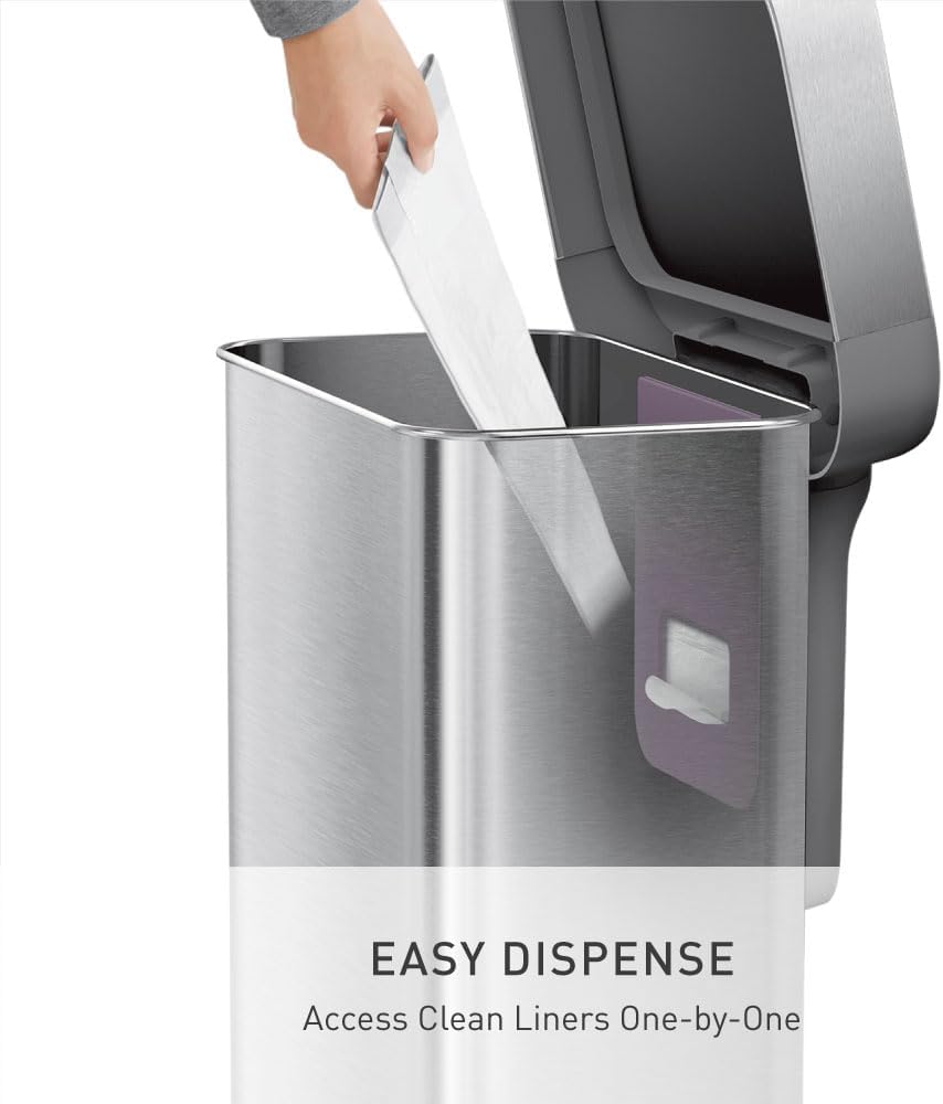 Rectangular brushed stainless steel step trash can with grey plastic lid and pedal mechanism, shown in modern kitchen setting — view 3a